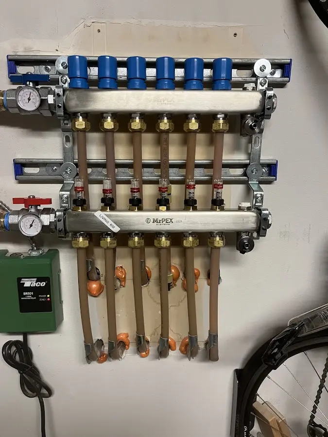 Plumber performing Gas Line Installation at a residential property in Bloomington